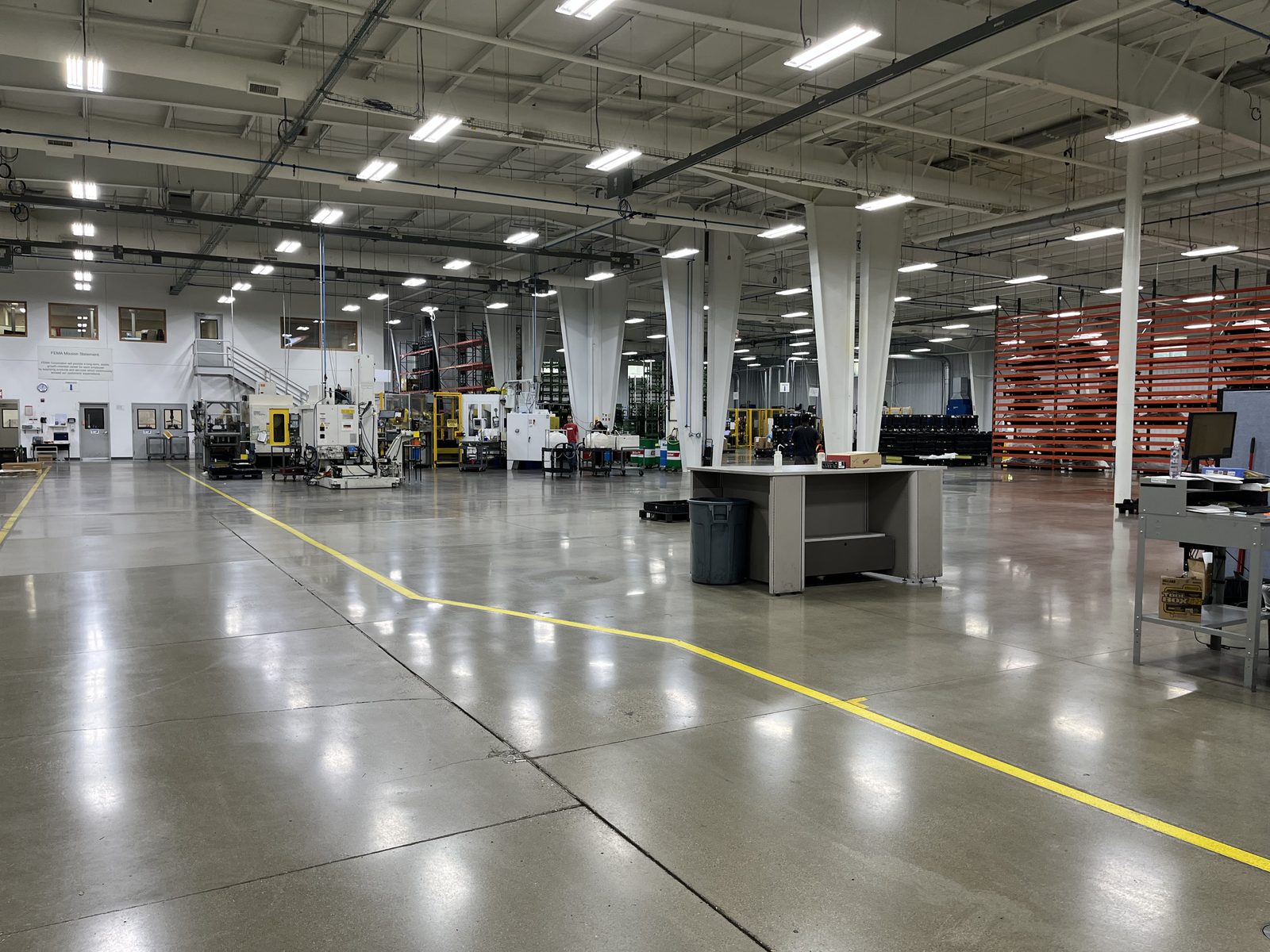 Industrial warehouse floor cleaned by CT Cleaners — manufacturing facility cleaning in Michigan