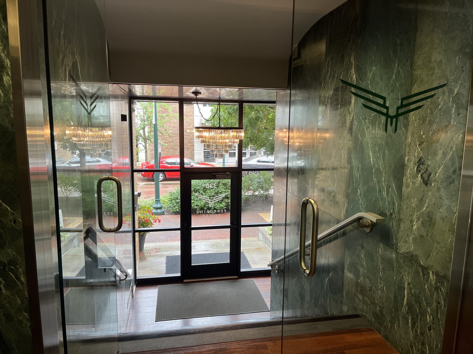 Glass entryway cleaned streak-free by CT Cleaners